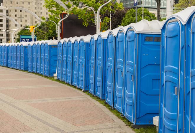 a row of portable restrooms at a fairground, offering visitors a clean and hassle-free experience in pomona